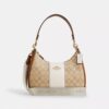 Bolso hobo Teri en Signature Canvas con rayas