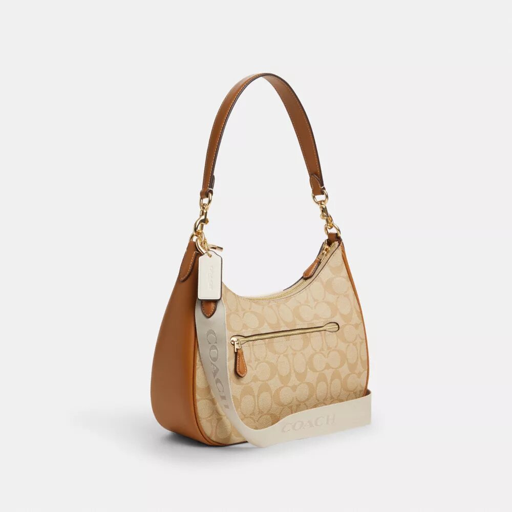 Bolso hobo Teri en Signature Canvas con rayas