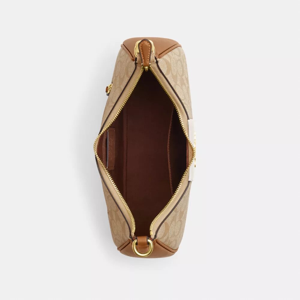 Bolso hobo Teri en Signature Canvas con rayas