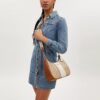 Bolso hobo Teri en Signature Canvas con rayas