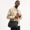 Bolso mensajero Colby 32 en Signature Canvas