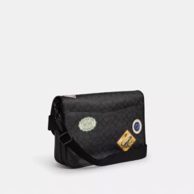 Bolso mensajero Hitch en Signature Canvas con parches