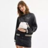 Bolso mini con cordón Faye
