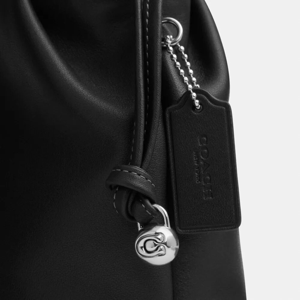 Bolso mini con cordón Faye