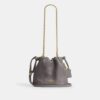 Bolso mini Faye con cordón y acolchado