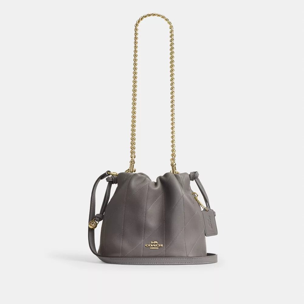 Bolso mini Faye con cordón y acolchado