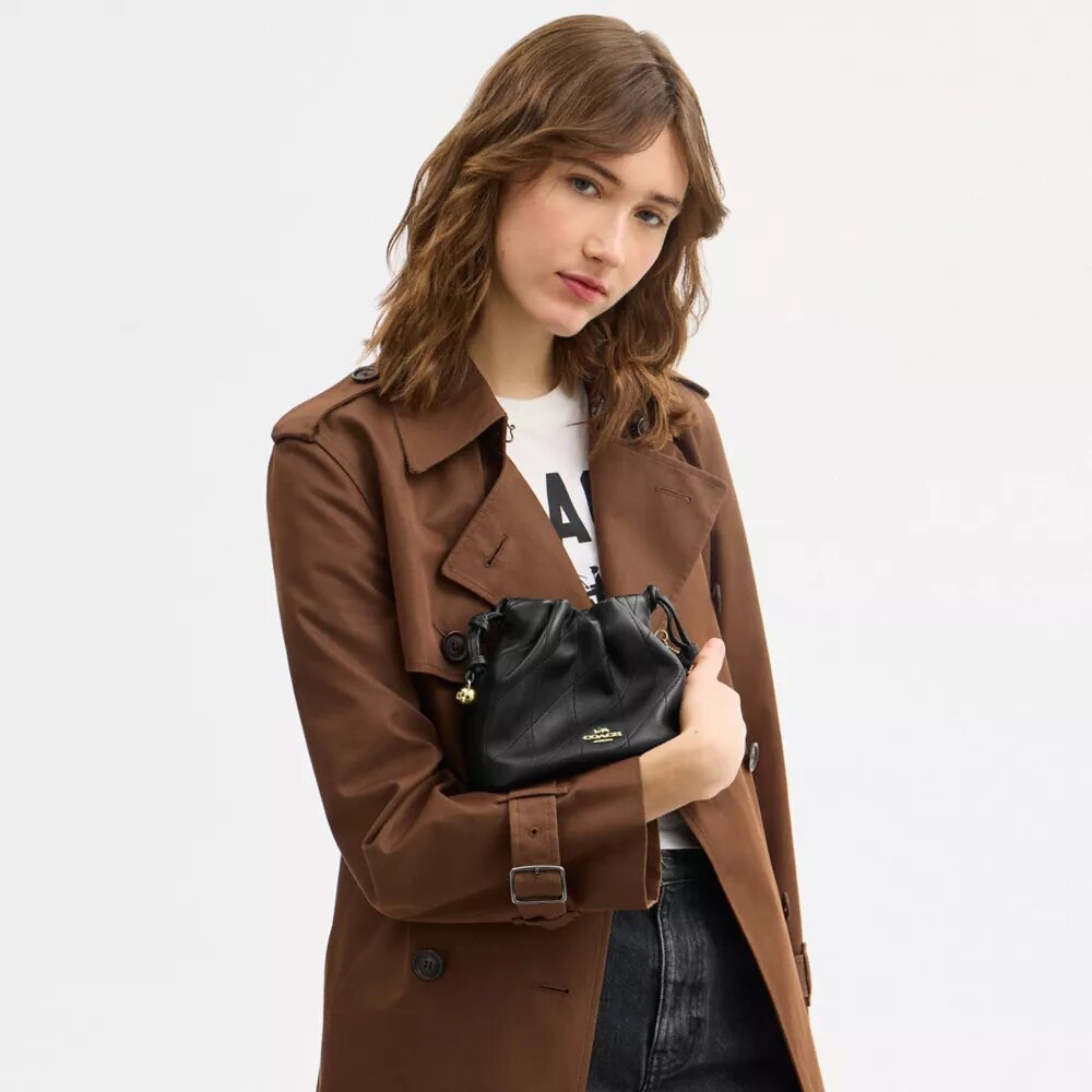 Bolso mini Faye con cordón y acolchado