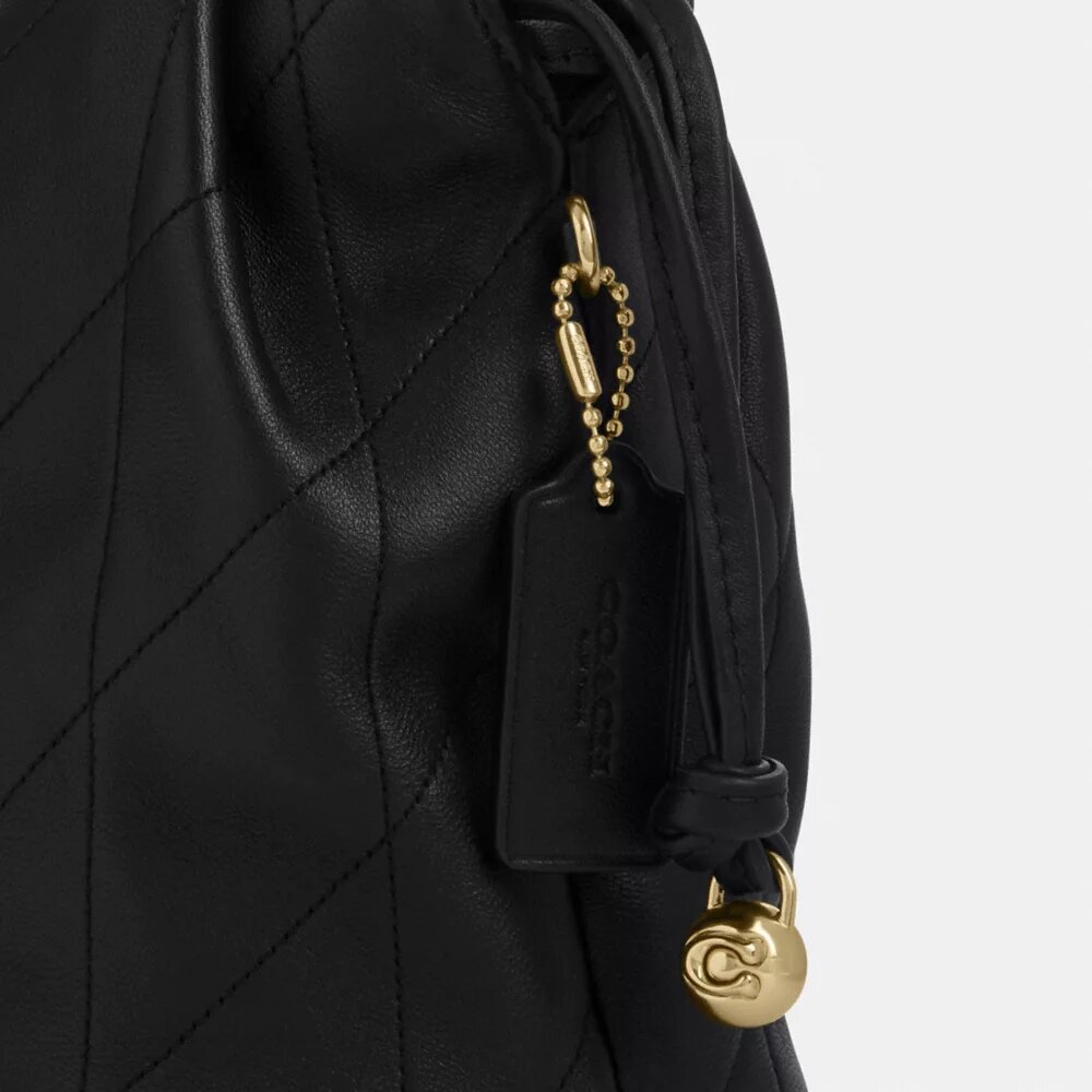 Bolso mini Faye con cordón y acolchado