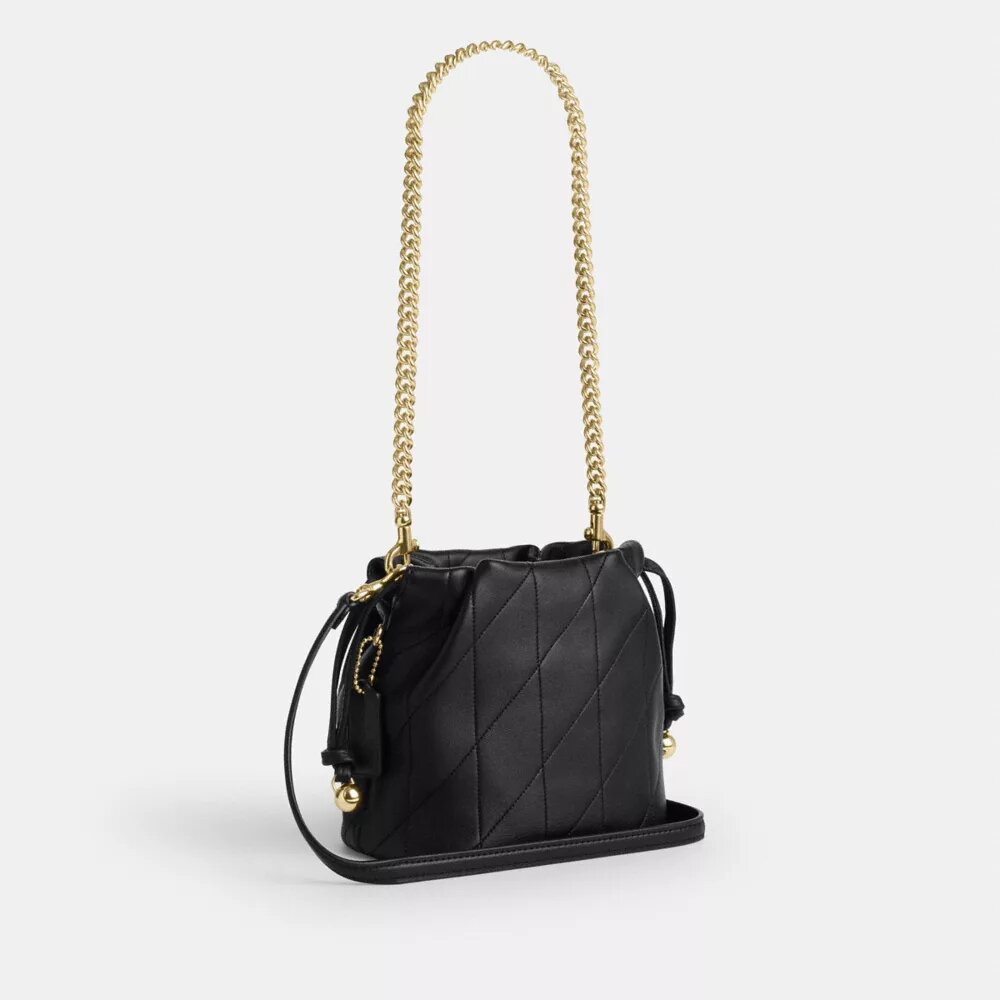 Bolso mini Faye con cordón y acolchado