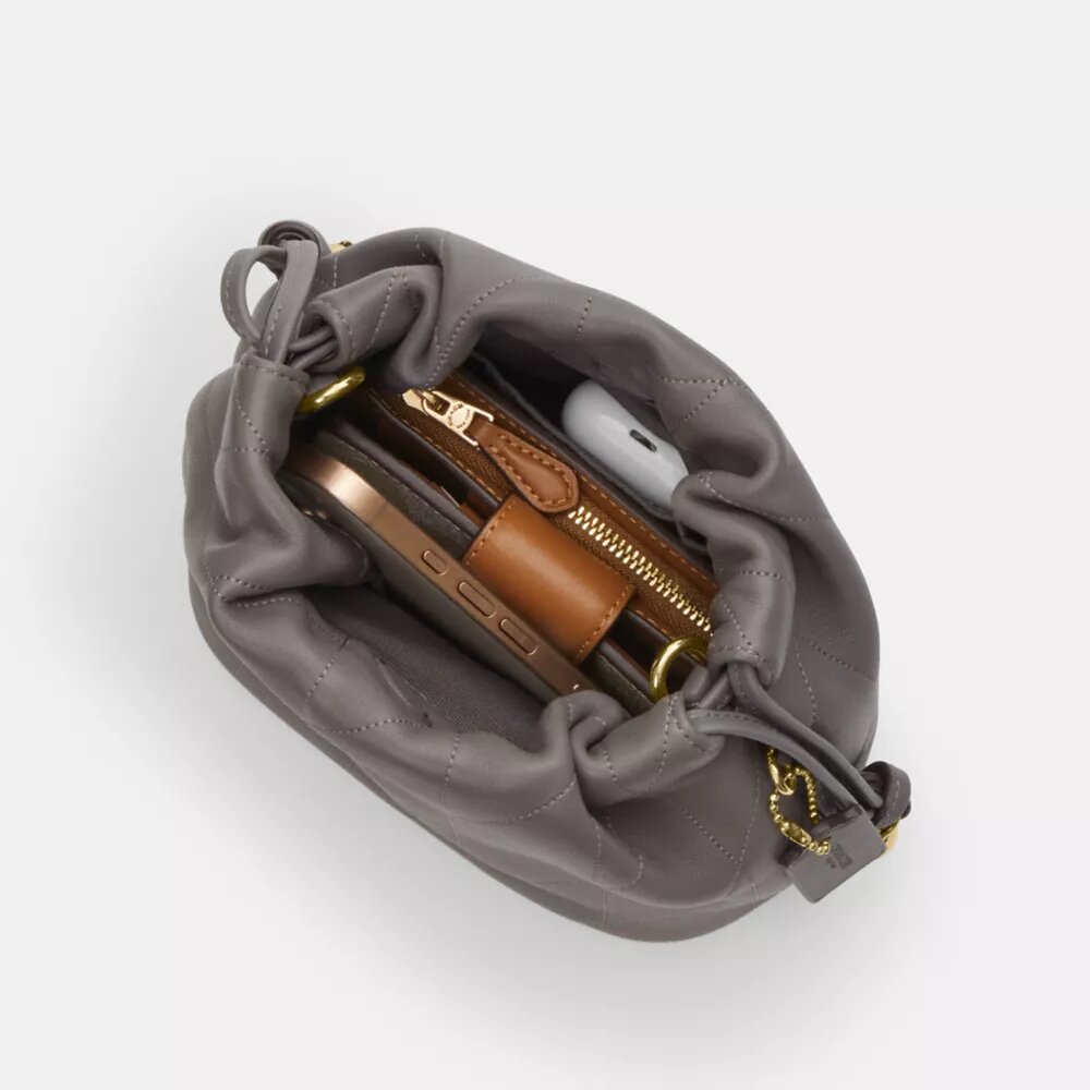 Bolso mini Faye con cordón y acolchado
