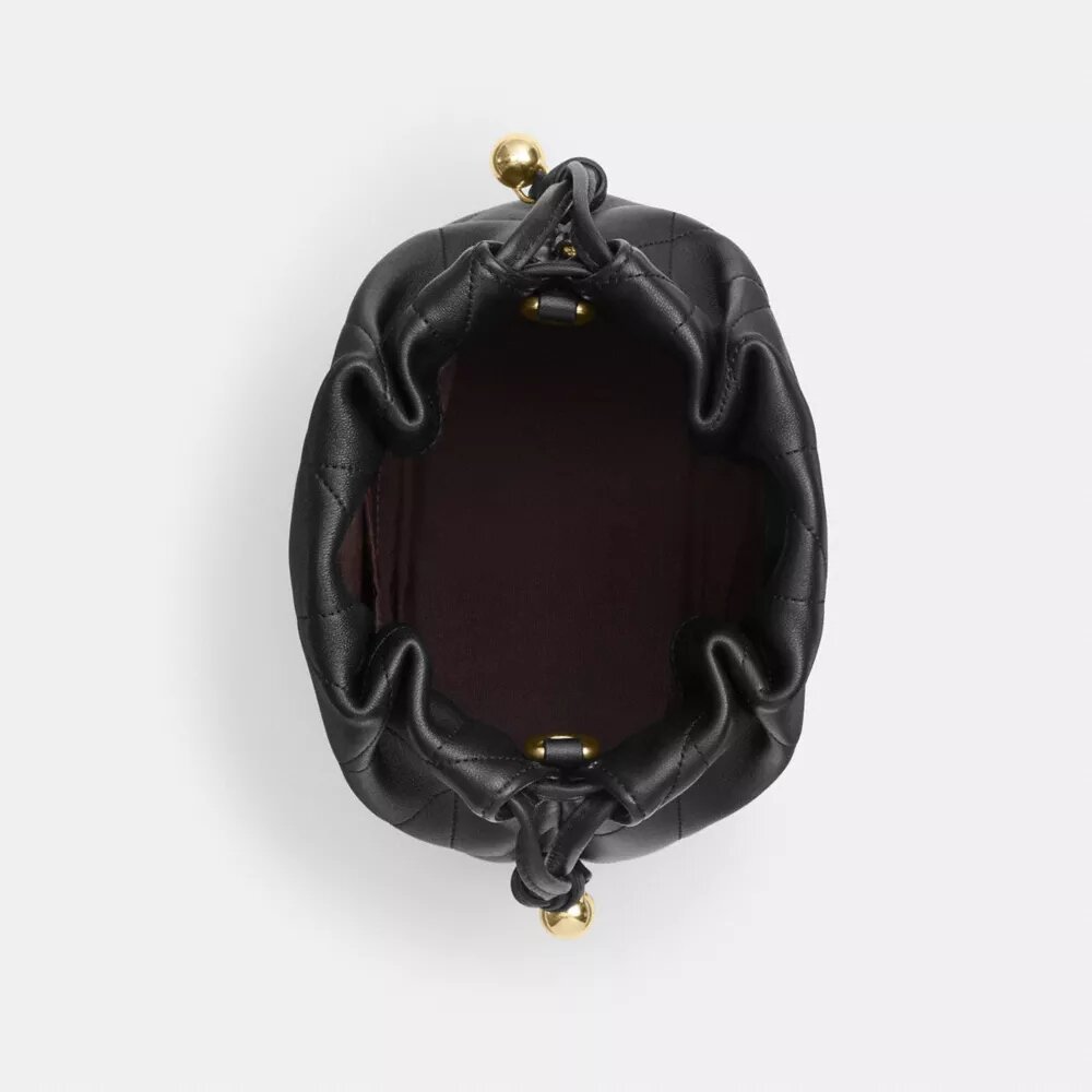 Bolso mini Faye con cordón y acolchado
