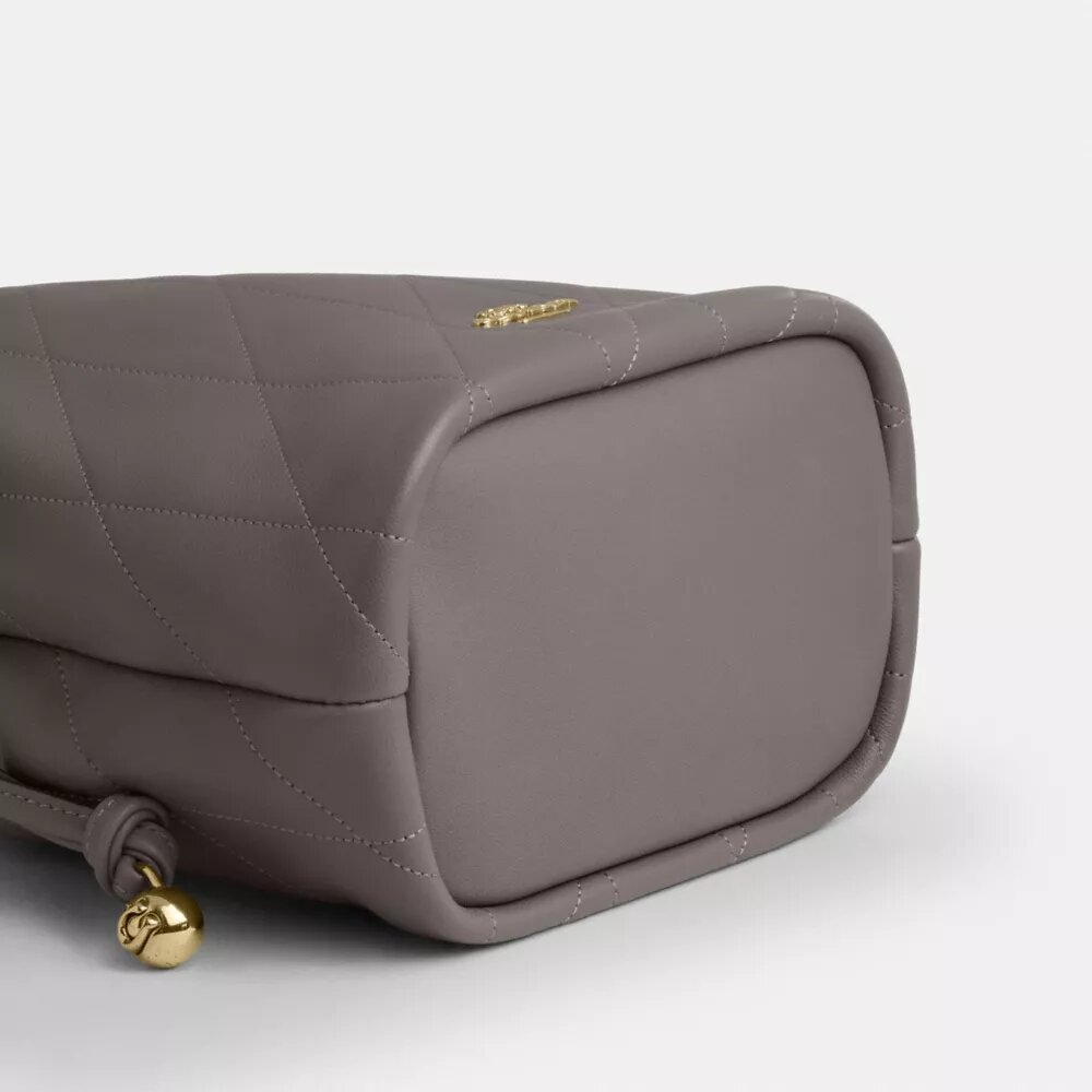 Bolso mini Faye con cordón y acolchado