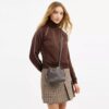 Bolso mini Faye con cordón y acolchado