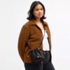 Bolso mini Faye con cordón y acolchado