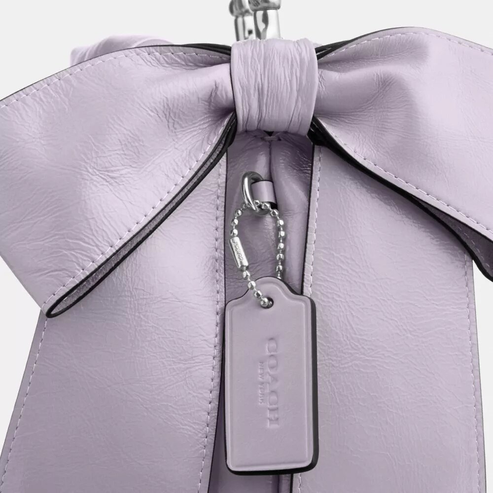 Bolso mini Faye con cordón y lazos