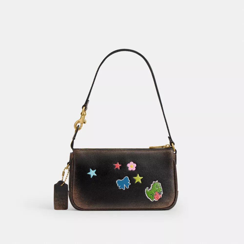 Bolso «Plaza» del 10.º cumpleaños de Rexy, de 18 in, en piel desgastada con estampado de pegatinas