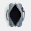 Bolso tipo cartera grande Rowan en denim desgastado con Charms