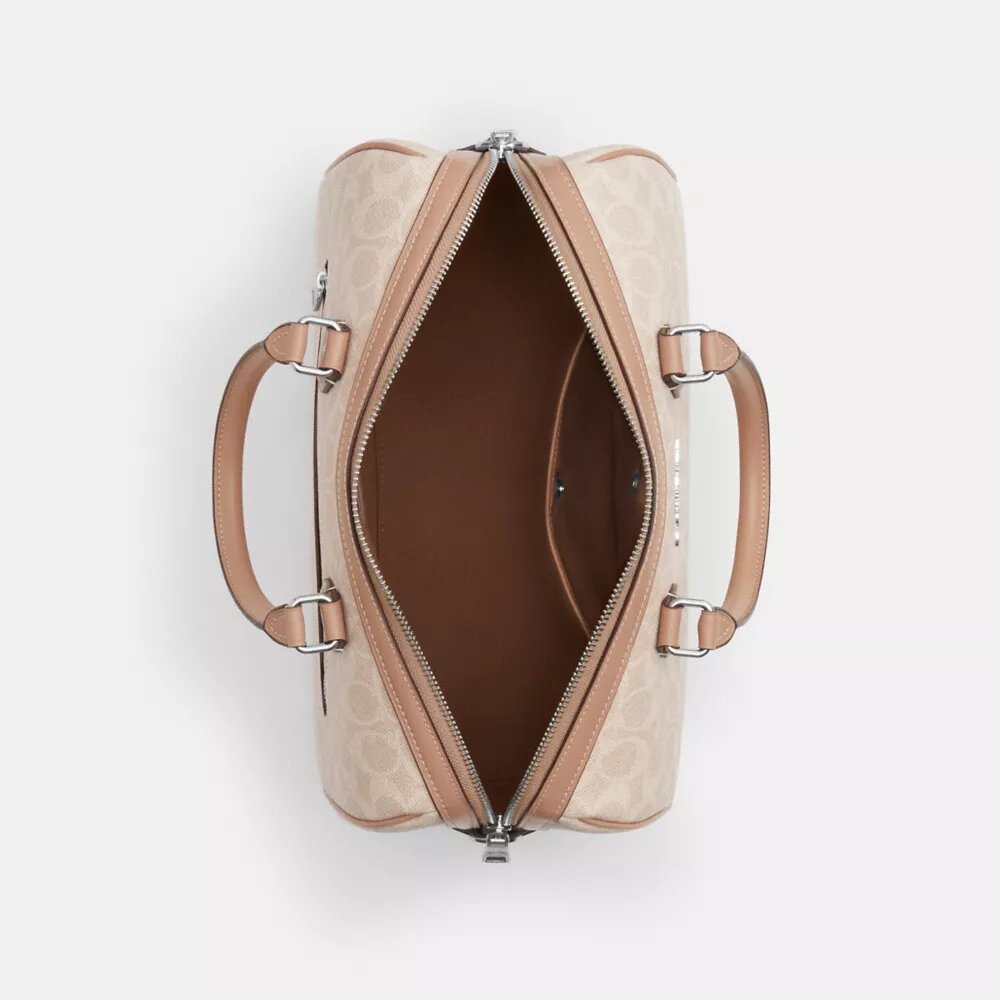 Bolso tipo cartera grande Rowan en Signature Canvas