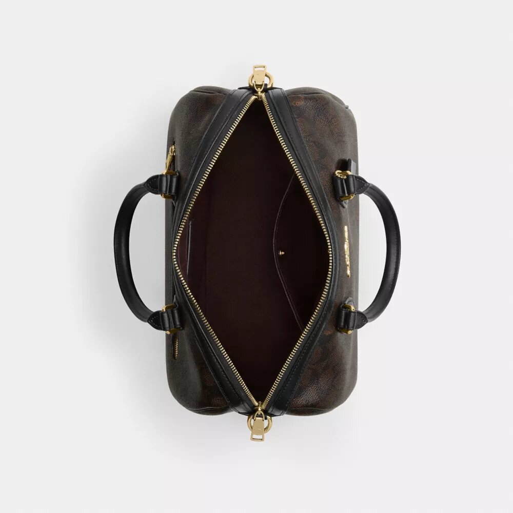 Bolso tipo cartera grande Rowan en Signature Canvas