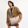 Bolso tipo cartera grande Rowan en Signature Canvas