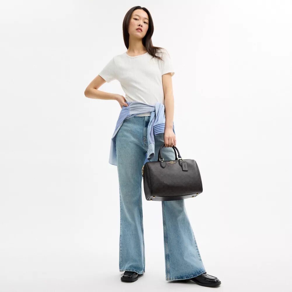 Bolso tipo cartera grande Rowan en Signature Canvas