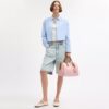 Bolso tipo cartera grande Rowan en Signature Canvas con Charms