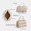Bolso tipo cartera Rowan en Signature Canvas