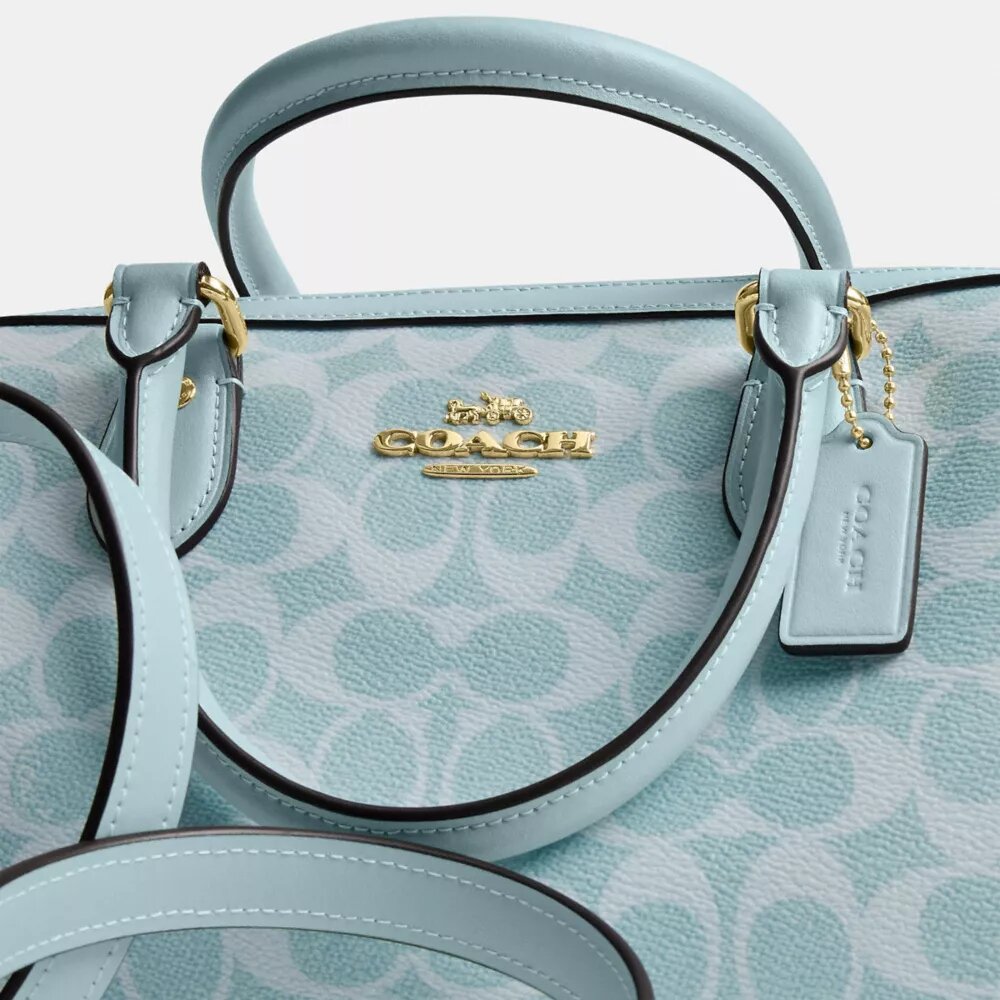 Bolso tipo cartera Rowan en Signature Canvas