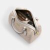 Bolso tipo cartera Rowan en Signature Canvas