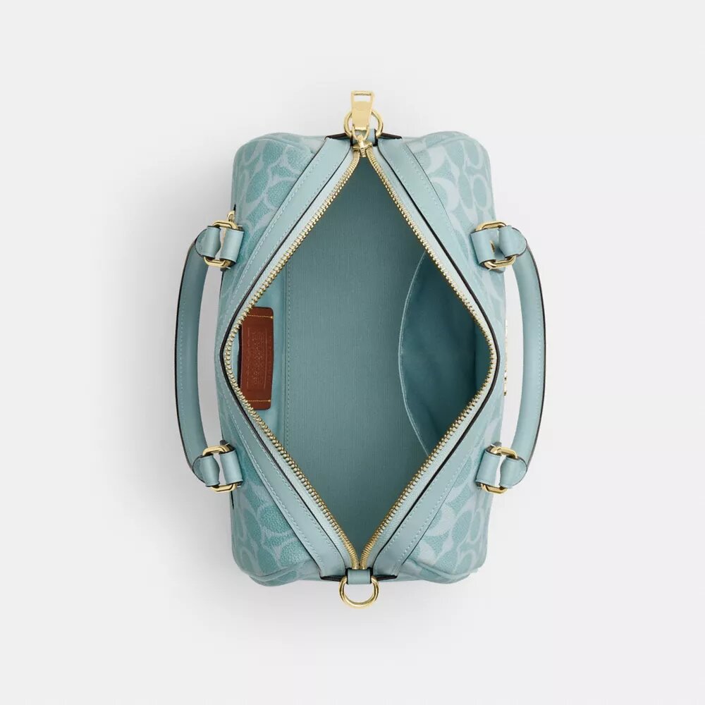 Bolso tipo cartera Rowan en Signature Canvas