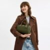 Bolso tipo cartera Rowan en Signature Canvas