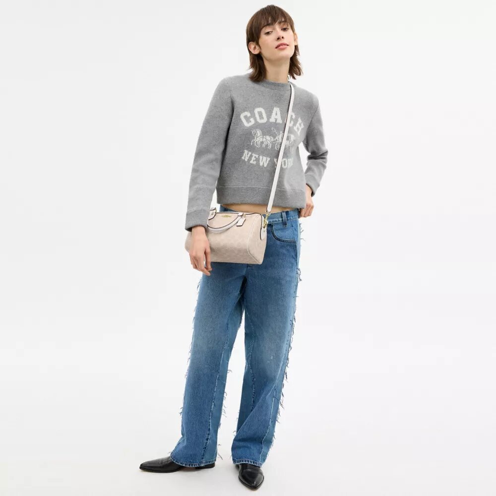 Bolso tipo cartera Rowan en Signature Canvas