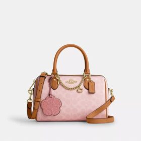 Bolso tipo cartera Rowan en Signature Canvas con Charms