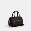 Bolso tipo cartera Rowan en Signature Canvas con Charms