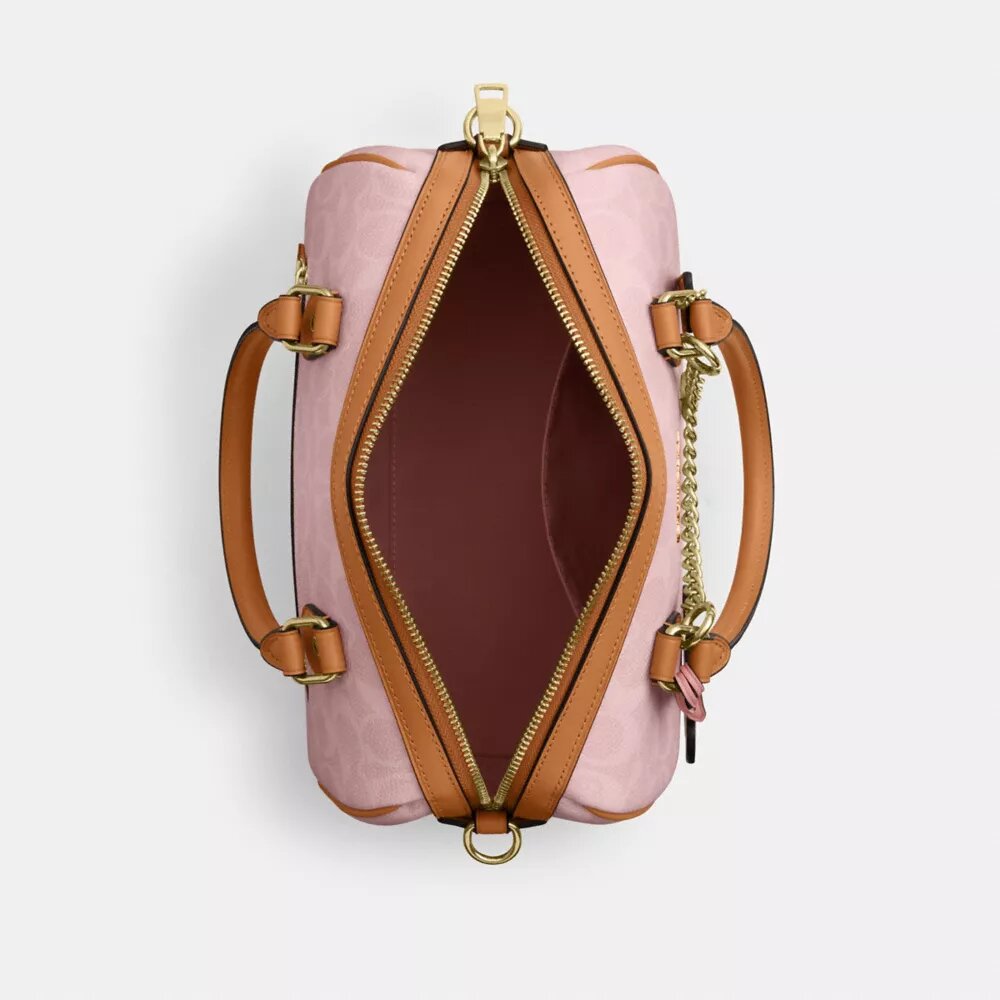 Bolso tipo cartera Rowan en Signature Canvas con Charms
