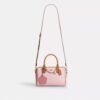 Bolso tipo cartera Rowan en Signature Canvas con Charms