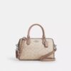 Bolso tipo cartera Rowan en Signature Canvas con diseño en bloques característico