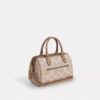 Bolso tipo cartera Rowan en Signature Canvas con diseño en bloques característico
