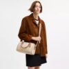 Bolso tipo cartera Rowan en Signature Canvas Rainbow