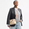 Bolso tipo cartera Rowan en Signature Canvas Rainbow