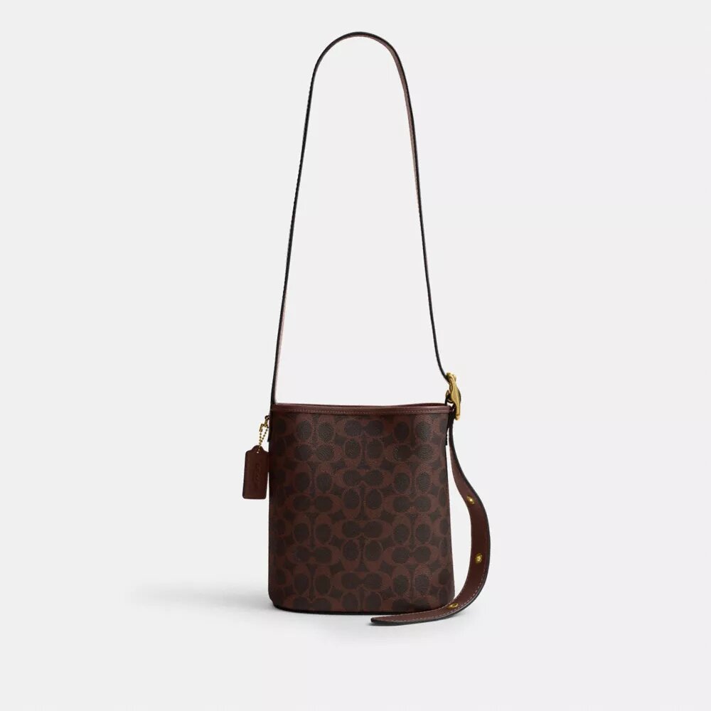 Bolso tipo cubo Bleecker 21 en Signature Canvas