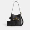 Bolso tipo cubo Bleecker con cierre Kisslock