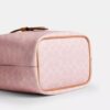 Bolso tipo cubo Rowan en Signature Canvas con Charms