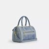 Bolso tipo satchel Rowan en denim desgastado con Charms