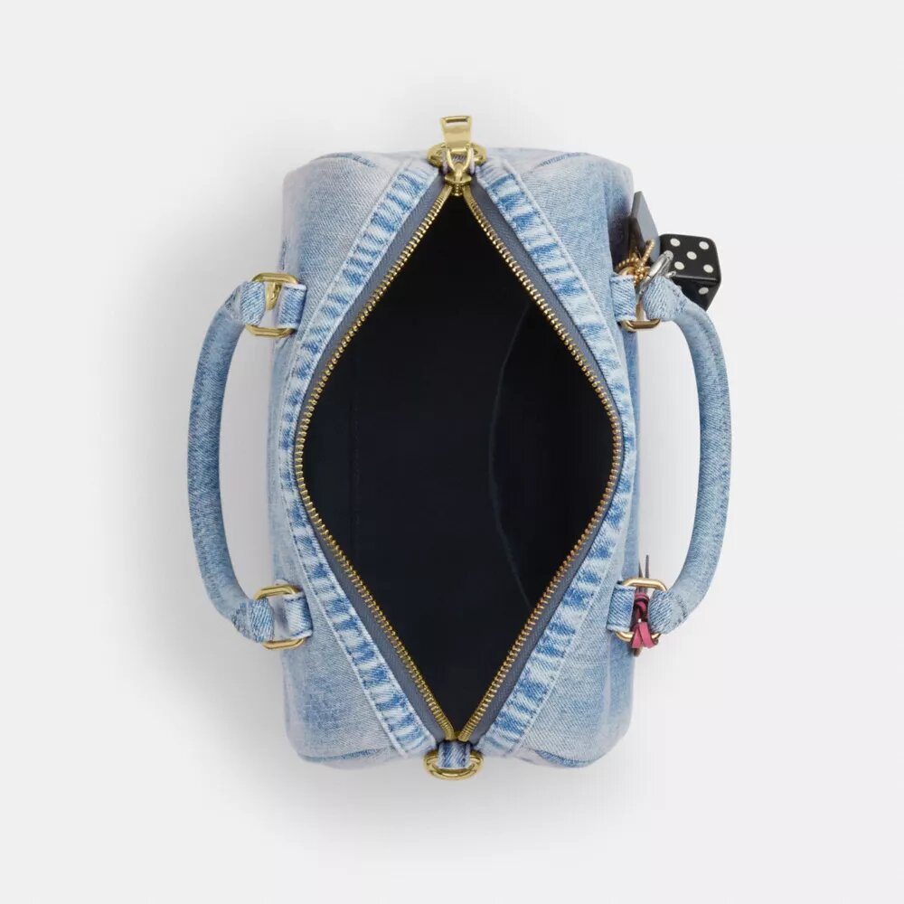 Bolso tipo satchel Rowan en denim desgastado con Charms