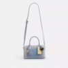 Bolso tipo satchel Rowan en denim desgastado con Charms