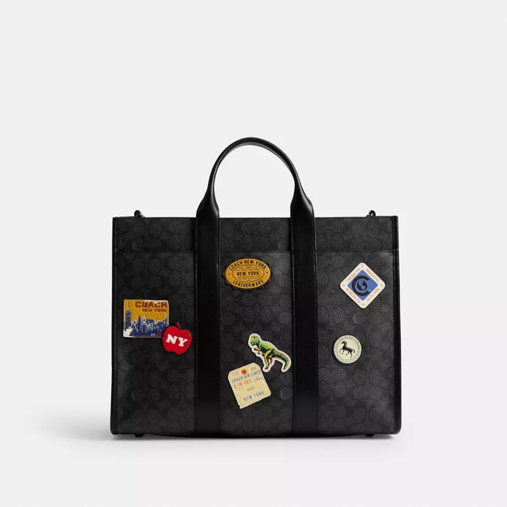 Bolso Wesley en Signature Canvas con parches