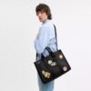 Bolso Wesley en Signature Canvas con parches