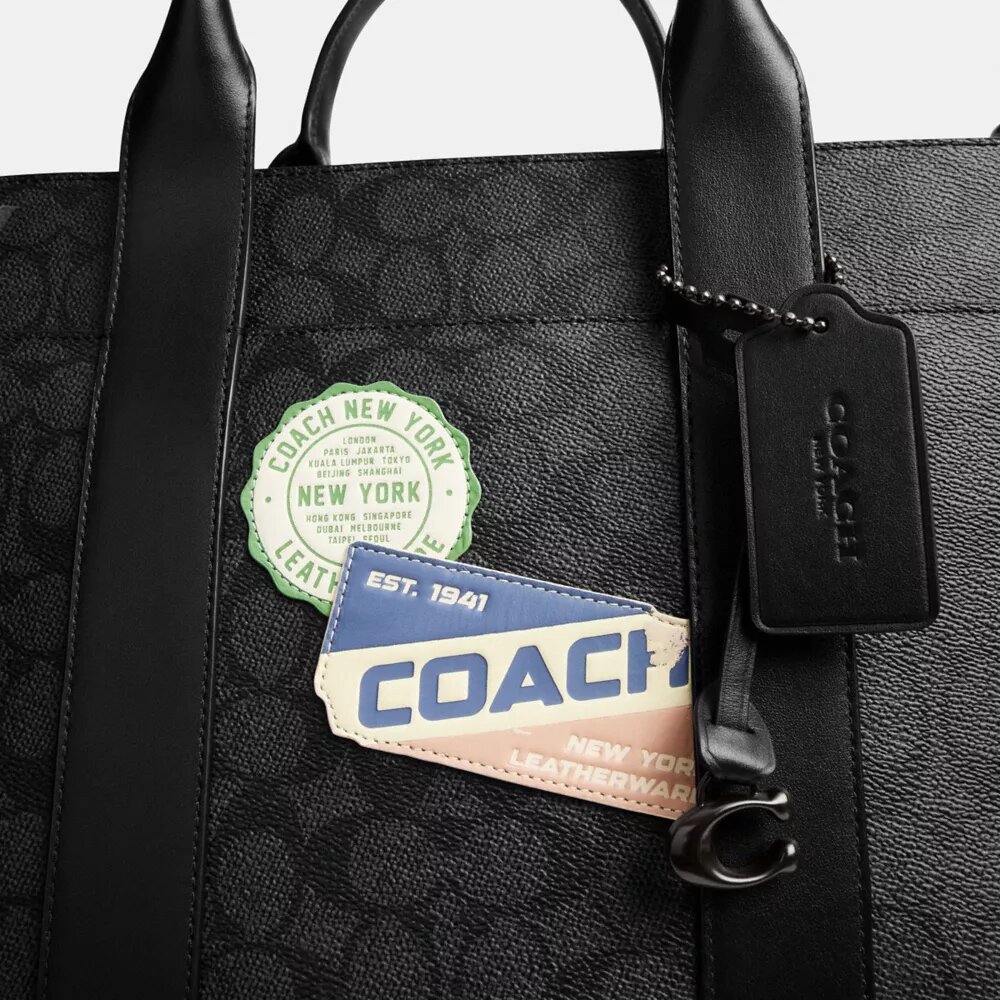 Bolso Wesley en Signature Canvas con parches