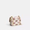 Bolsos bandolera Mini Klare con estampado de caramelos